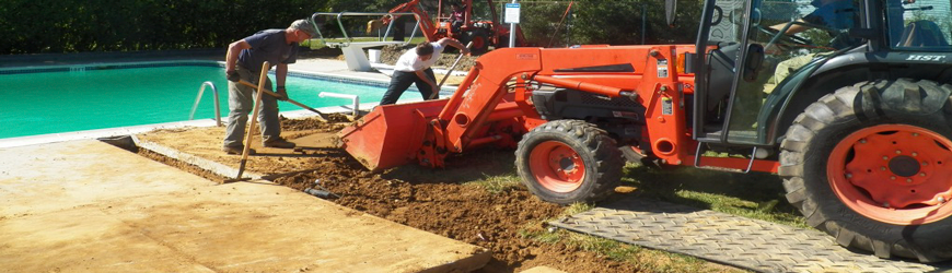 Bobcat driving on alturna mats