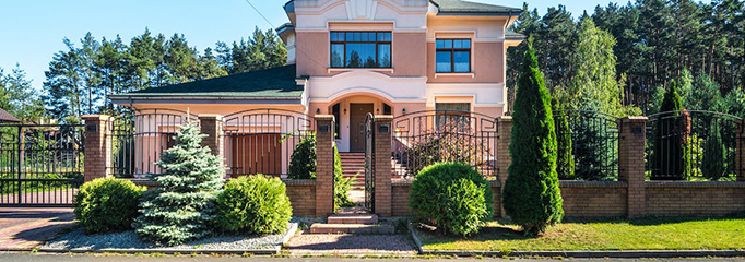 A front yard with evergreen plants for a year-round curb appeal