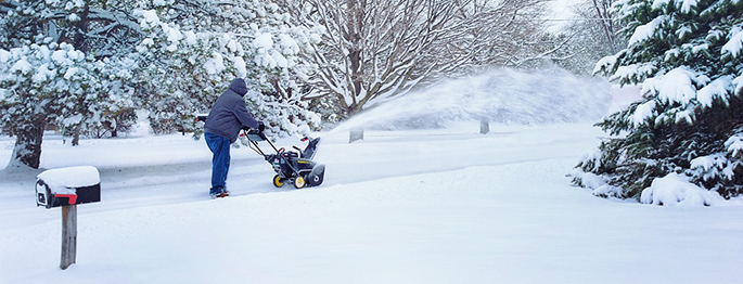 Doing the required work after transitioning from lawn care to snow removal.